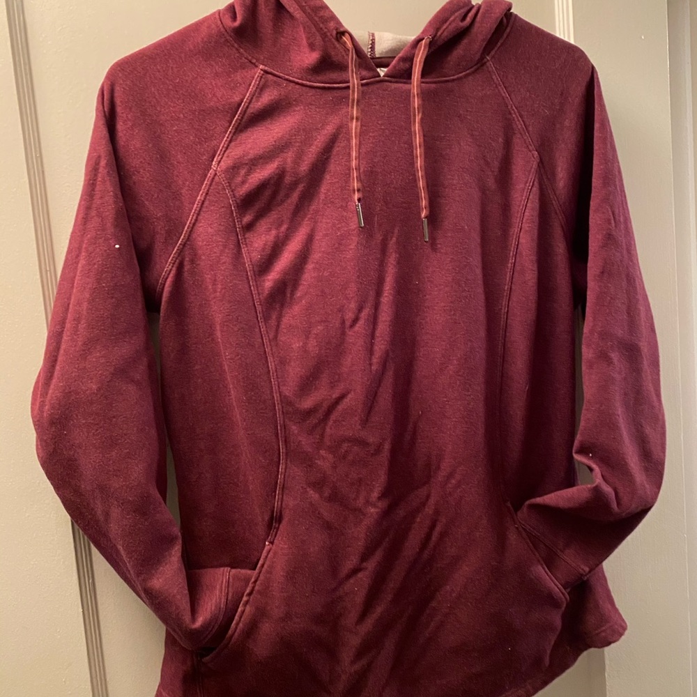 Purple/maroon athletic hoodie.